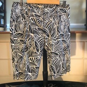 Fitted black and white shorts.